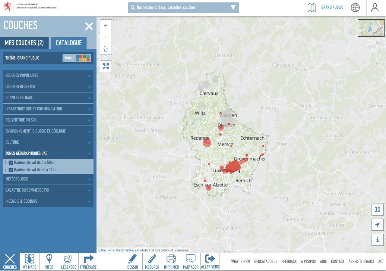 Géoportail : les deux couches de hauteur UAS sont cochées dans le catalogue, et les zones actives apparaissent en rouge sur le Luxembourg.